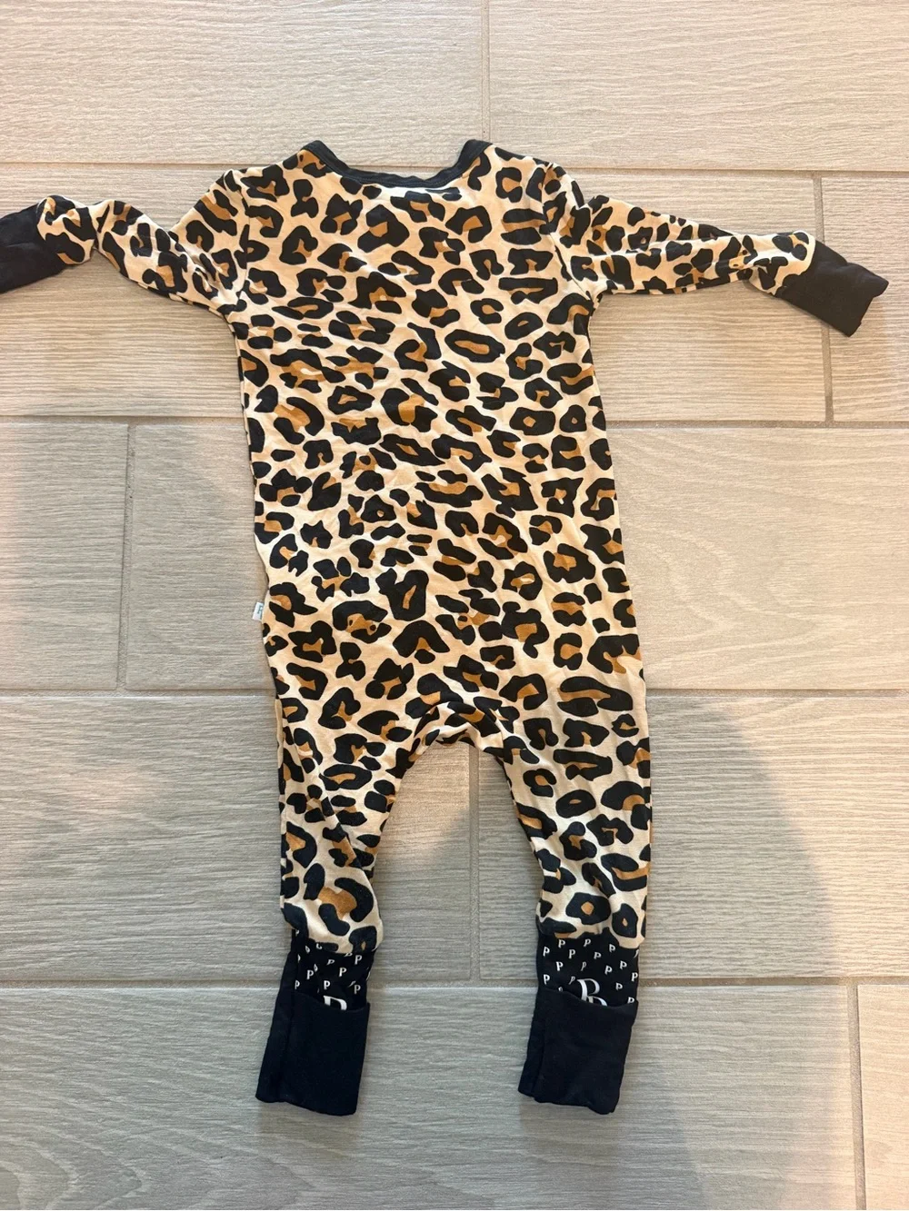 Posh Peanut Leopard Print One-Piece Footie with Black Trim